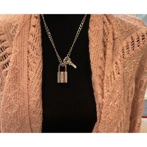 💥SOLD💥💥Louis Vuitton Silver Lock Necklace # 318
Exceptional Quality!